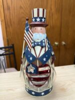 TIN UNCLE SAM PATRIOTIC VOTIVE CANDLE HOLDER WITH AMERICAN FLAG