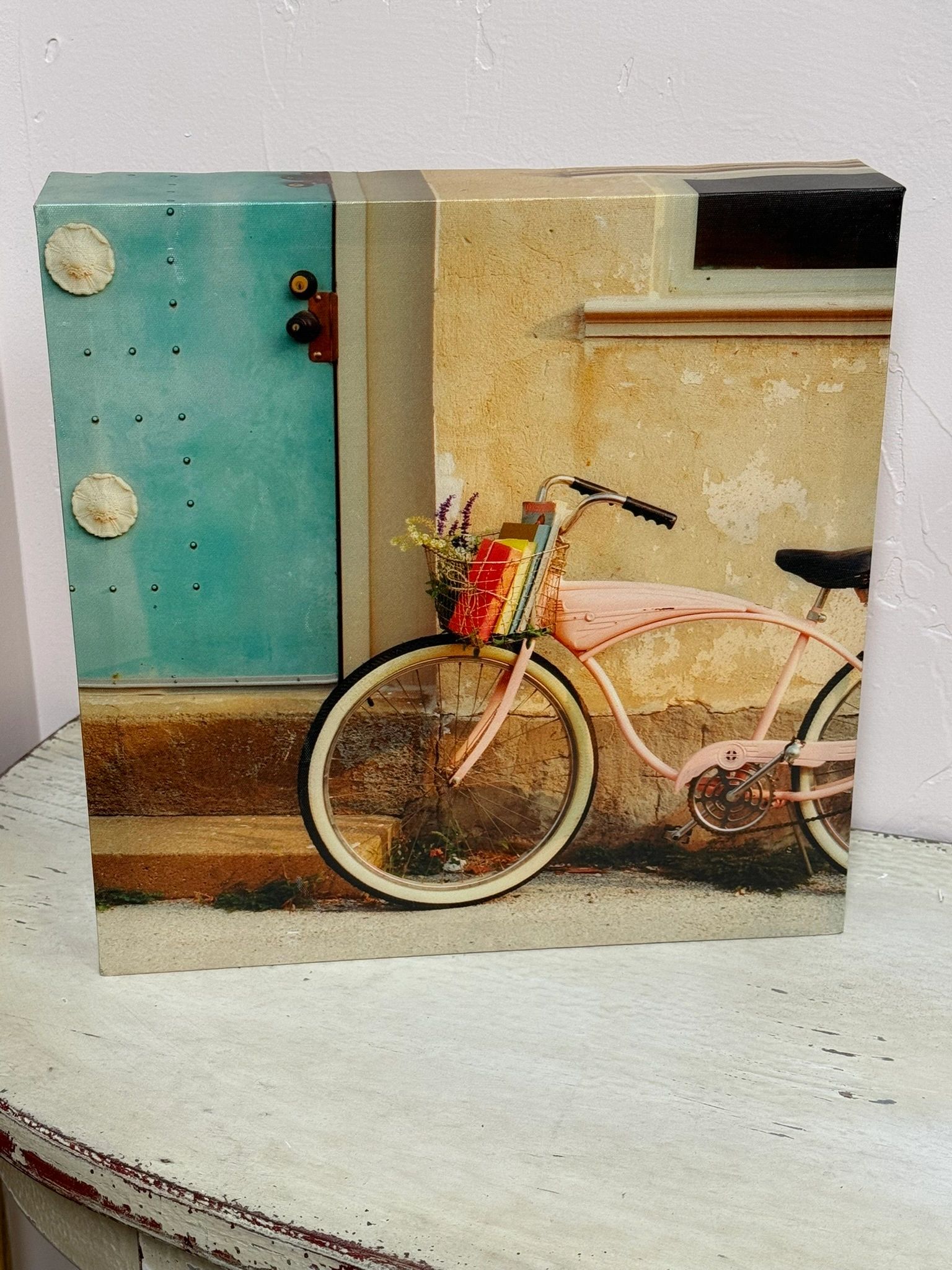 IMG_0933.jpeg ART WITH BYCYCLE/DOOR - TEAL/PINK/TAN COLORING - Image 1