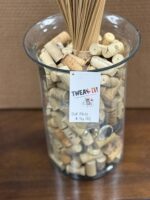 CLEAR VASE 12"H X 9" W WITH DRIED CORKS AND DRIED BANANNA LEAVES - Image 2