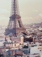 CANVAS PRINT OF THE EIFFEL TOWER AND PARIS AT SUNSET
