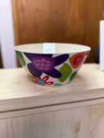 PLASTIC SERVING BOWL DECORATED WITH COLORED FLOWERS 10" ROUND